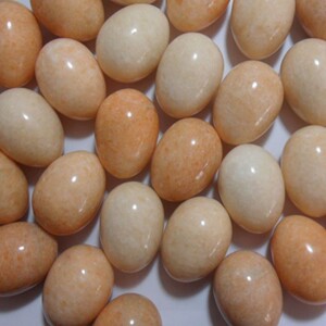 鹅卵石奇石鸡蛋石头摆件把玩天然椭圆原石汉白玉米黄玉风水石包