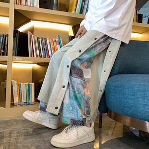 李宁贵宾腰果花卫裤男潮牌春秋炸街痞帅裤子设计感宽松大码排扣休