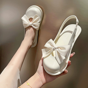 包头凉鞋女夏2022年新款时尚平底仙女鞋配裙子透气蝴蝶结流行鞋子