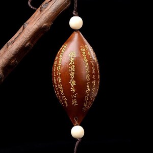 印尼橄榄核刻字单籽心经收藏文玩橄榄核雕印尼橄榄核单子烫金心经