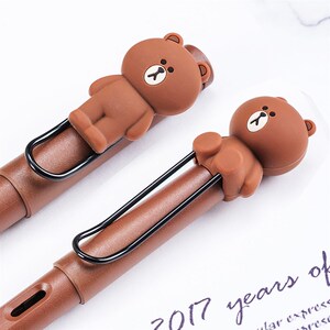 德国lamy凌妮k皮卡丘布朗熊可美兔钢笔卡通硅胶笔套学生笔夹装饰