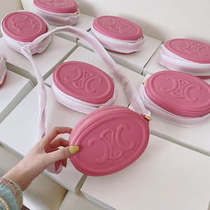 高级质感粉色包包女凯旋门月饼包mini猪鼻子包真皮单肩斜挎圆饼包