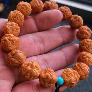 小雕刻龙野生籽纹文玩财神桃核手串精品手持姜荷叶黄皮手链山核桃