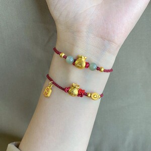 周大福焕美元宝纳福手链女福袋2022年新款编织手绳中秋礼物送女友