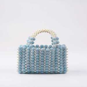 On the new red bayberry ball pearl color candy handbag hand