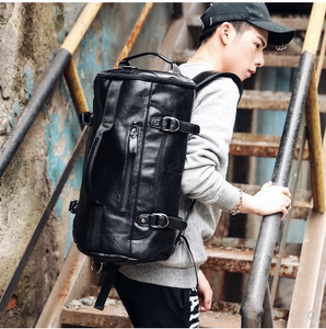 新款真皮运动包牛皮双肩包圆桶包旅游背包男女户外旅行包手提两用