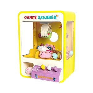 儿童迷你抓娃娃机夹公仔机小型家用投币玩具扭蛋机糖果电动游戏机