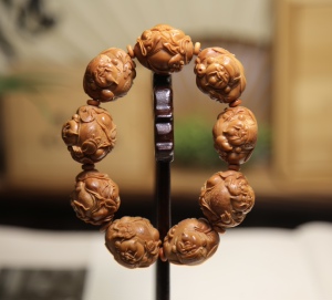 橄榄核雕 孙建忠大师 横财神 2.4x2.5 油核 正高级工艺美术大师