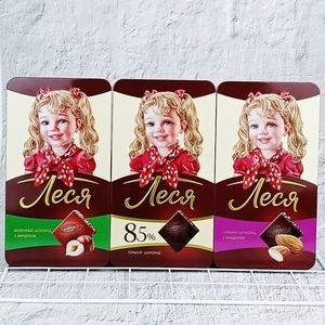 俄罗斯进口olexia铁盒装女孩黑巧扁桃仁榛仁85%95%夹心牛奶巧克力