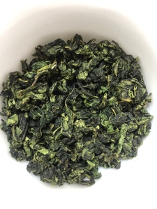 福建乌龙茶铁观音清香型茶叶，口感浓郁香醇。回甘持久，颜色翠绿
