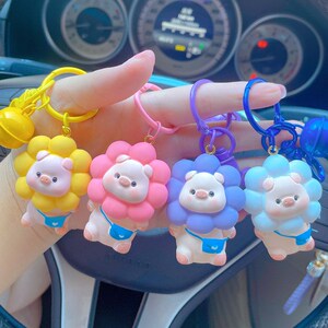 801人付款天猫太阳花小猪钥匙扣女创意车钥匙挂件可爱