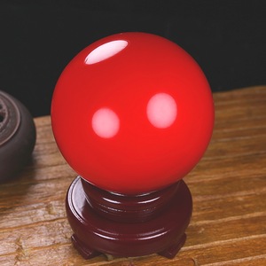 天然冰洲石萤石夜光球夜明珠原石红色发夜光石风水球镇宅家居摆件