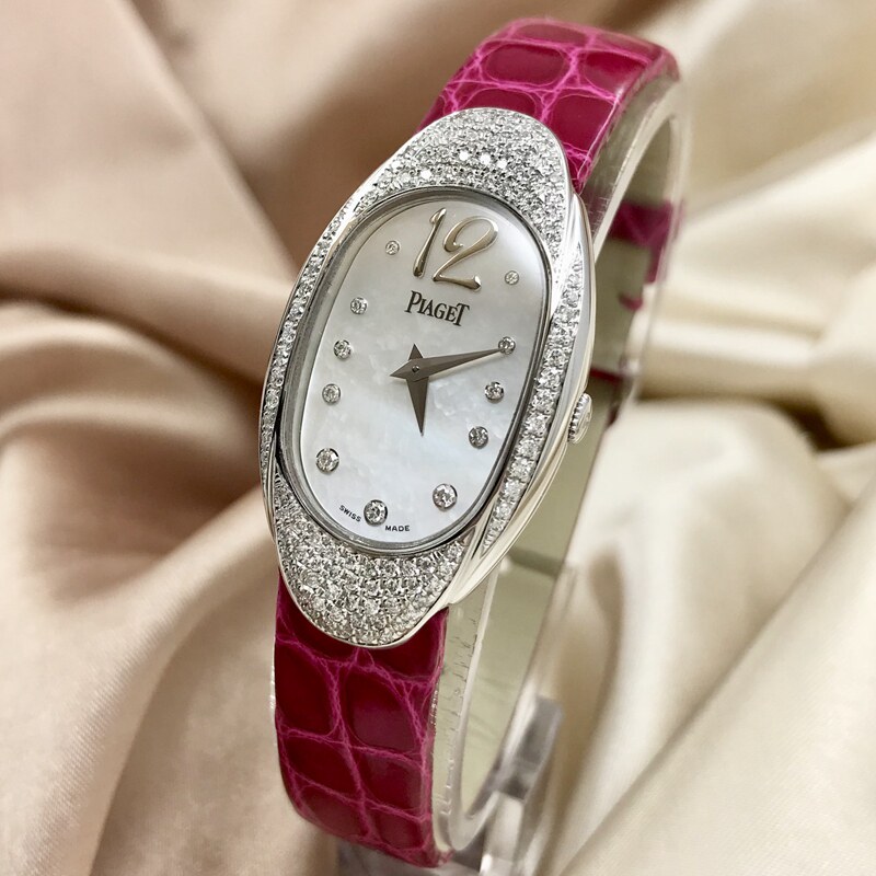 3,伯爵手表,swiss made的背面还印着什么,请看看是真是假?价格