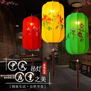 现代简约新中式餐厅布艺手绘灯笼仿古典宫灯创意冬瓜长形LED吊灯