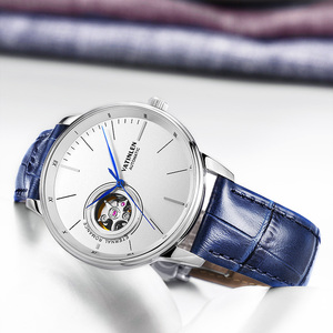 新款华天伦手表男全自动机械表真皮带防水镂空时尚休闲超薄男表dw