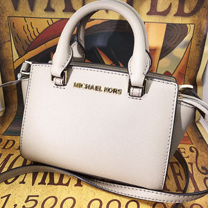 mk女包斜挎耳朵