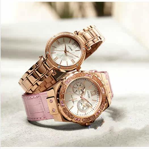 2,我叔叔从上海给我买了一块手表.上面有两个英文单词,guess steel.