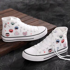 芝麻街同款高帮时尚手绘白色帆布鞋男女情侣学生休闲涂鸦diy板鞋