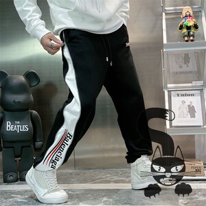 balenciaga巴黎世家 新款可乐字母图案拉链拼接卫裤男 裤子女长裤