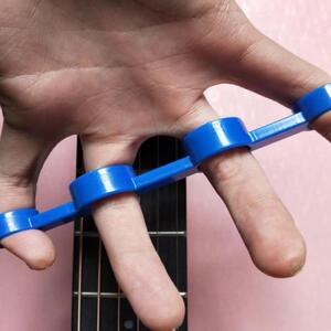 武熙乐器专营店天猫指力器钢琴吉他二胡乐器通用手指练习器分跨扩指