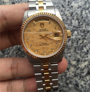 帝舵帝陀手表王子系列星期日历型金色布纹钻面瑞士机械男表18k金