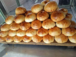 开开芯芯旗舰店天猫新疆烤包子牛羊肉酥皮和田烤包子手工馕坑现烤