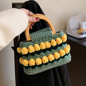 高级感毛线包包女2022新款潮时尚编织水桶包小清新花朵篮子手提包