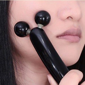 脸部按摩器滚轮牛角