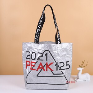 银色平纹杜邦纸袋定做手提织带印刷logo图案单肩购物环保厂家订制