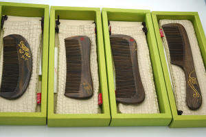 001人付款淘宝谭木匠yhcgb0301 yhcgb0302沉贵宝木梳子家用带手柄实惠