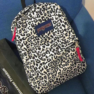 jansport杰斯伯豹纹双肩包女中学生帆布书包男大容量荧光绿电脑包