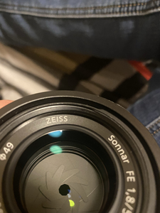 出一个索尼551.8蔡司镜头,买来发现有点掉膜不影响成像,很