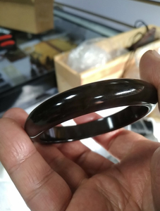 辽西北票西官树化玉黑冰手镯