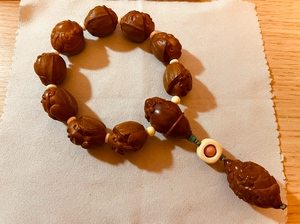 梦梵橄榄核雕,大脸弥勒,手串部分8 1颗,顶珠2.1其余8颗