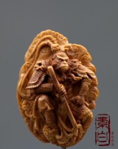桃核作品 核雕精品 名家作品 素白核雕齐天大圣作品已落户泉品