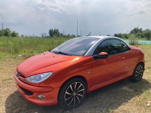 00奇奇二手车淘宝标志206cc硬顶敞篷!手续齐全!敞篷功能正常!