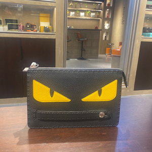 fendi/芬迪黄色小恶魔眼睛款手拿包,限量款,成色99新