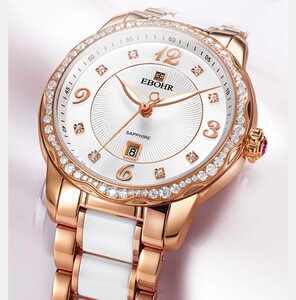 依波表,八成新,两个表带.春花瓣型镶钻石英表女士手表防水日历