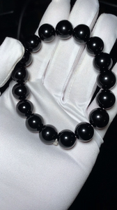 顶级雷公墨冲击玻璃陨石手串,颗颗透光.