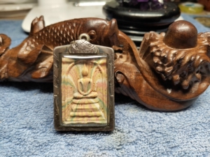 周冠罗 彩泥崇迪,纯银壳自然氧化.保真,督造量大,故而便宜.