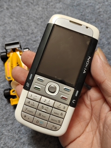 诺基亚5700国行正品熊猫色黑白版,变形金刚扭腰音乐手机