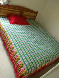 贵州省少数民族布依族土布手工艺品花边流苏床单