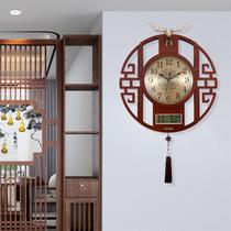 New Chinese perpetual calendar wall clock mute living room atmospheric deer head clock personality creative hanging wall watch wooden clock