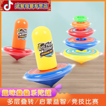 Fun stacked music gyro rotating small Toro launcher childrens toys boy new turn music overlay overlap