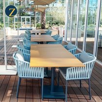 Outdoor rattan table and chair balcony rattan chair combination sunscreen waterproof casual outdoor restaurant cafe table and chair three-piece set