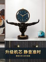 Nordic creative bronze man light luxury mute art desktop clock clock home Modern Personality fashion creative clock