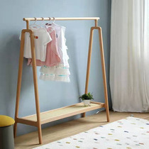 Japanese solid wood rattan bedroom floor-to-ceiling cloak rack Nordic luxury home Modern simple creative storage hanger