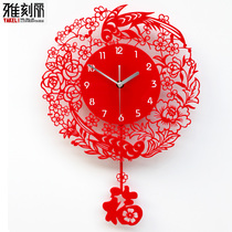 Yakeli new Chinese clock wall clock Living room mute modern minimalist art wall clock creative table Quartz clock