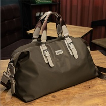 Travel bag male portable large capacity short distance travel bag luggage bag female travel light fashion leisure business travel