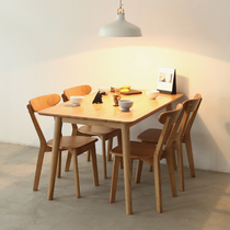 Dining table and chair combination rubber wood walnut color Japanese style simple small family table table Nordic full solid wood dining table
